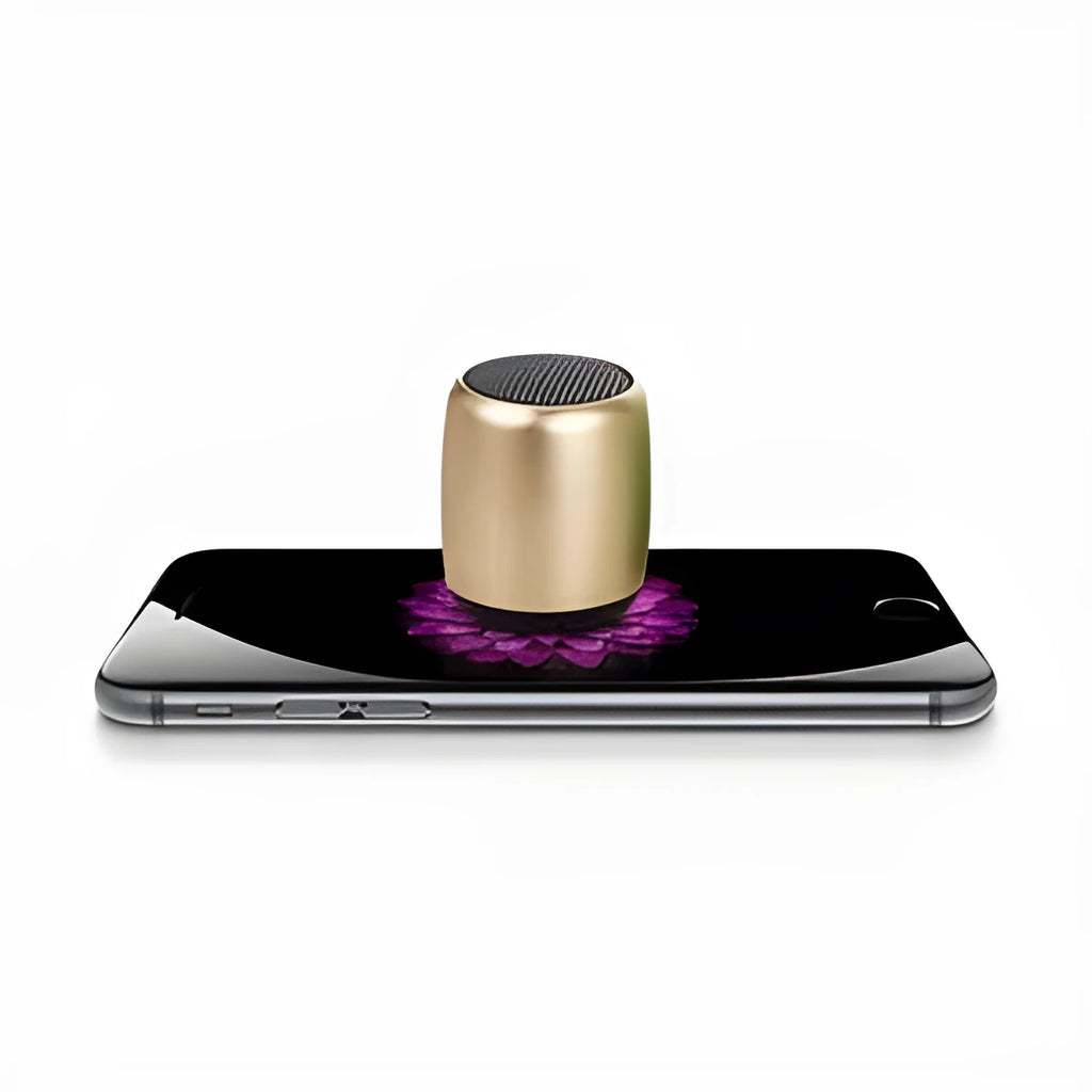 Portable mini Bluetooth speaker in multiple colours with wireless audio and hands-free calling