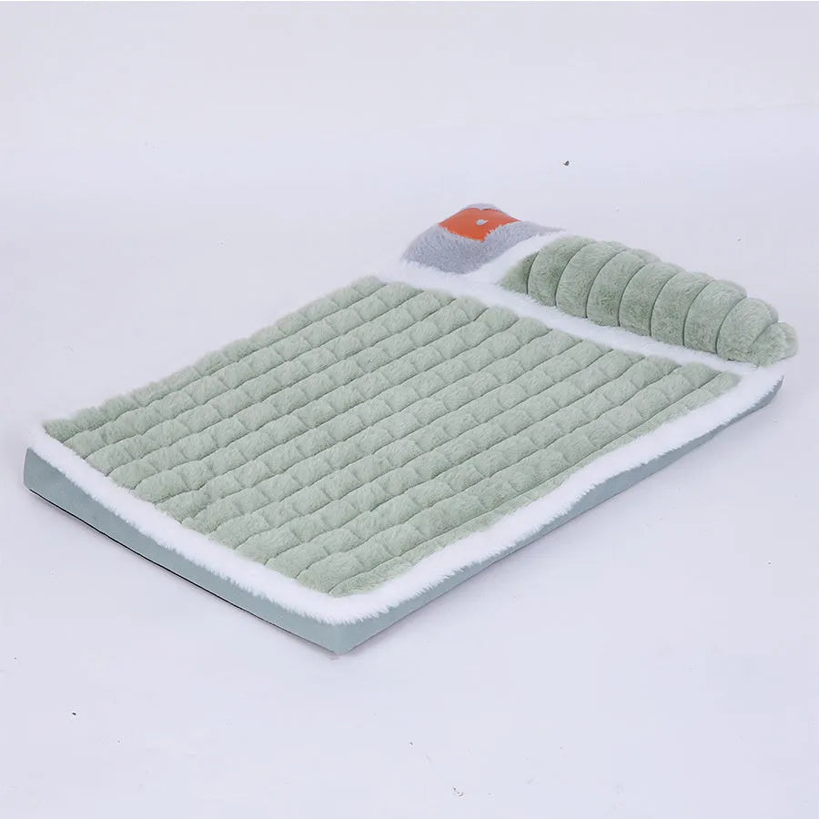 A large grey washable dog mat with a detachable cover, shown with a dog lying on it.