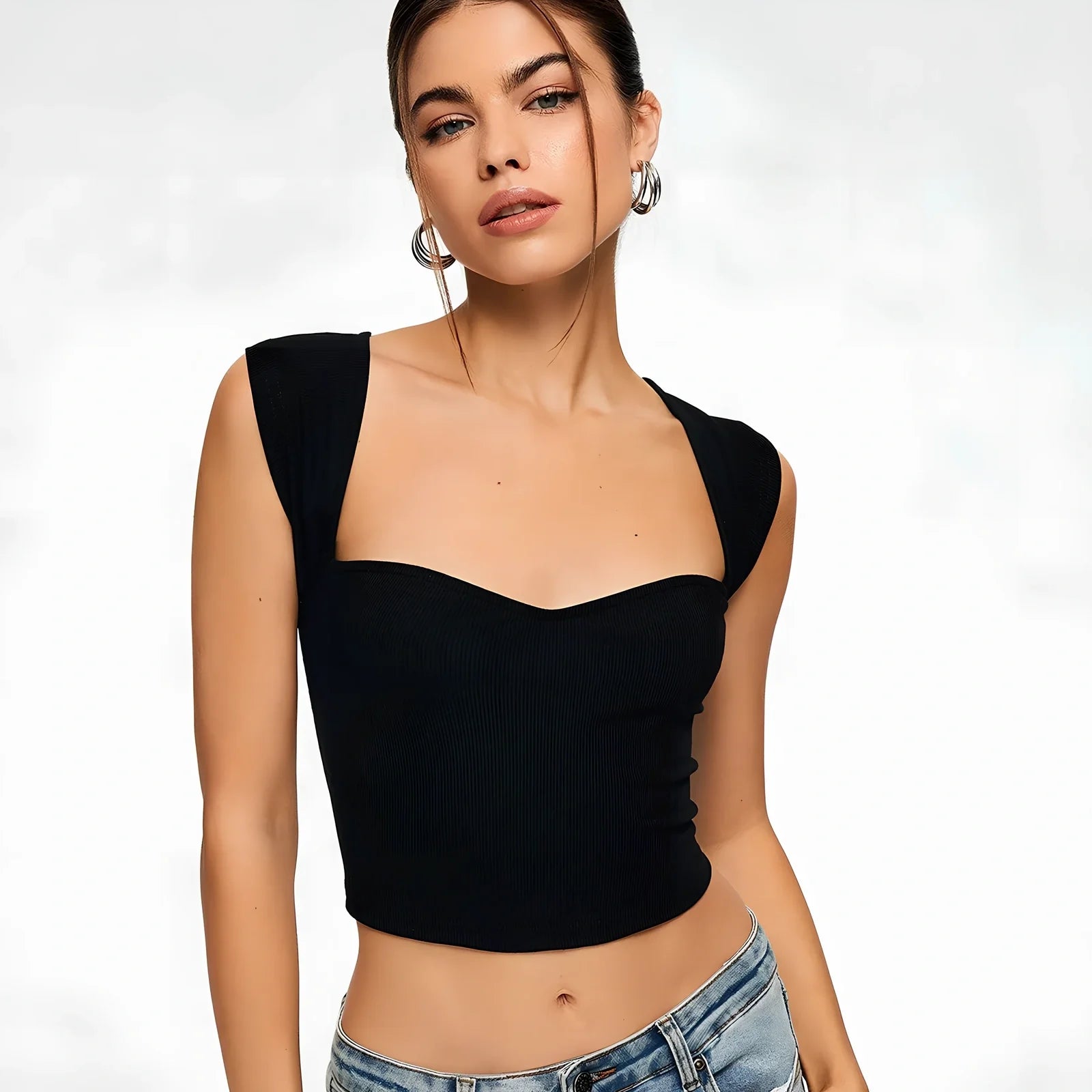 Black ribbed sleeveless crop top with sweetheart neckline, 90% polyester 10% spandex, sizes XS-XL