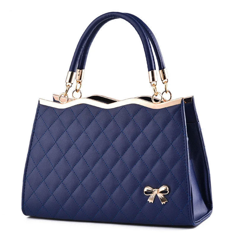Crossbody shoulder bag with decorative bow in various colors, made from PU leather