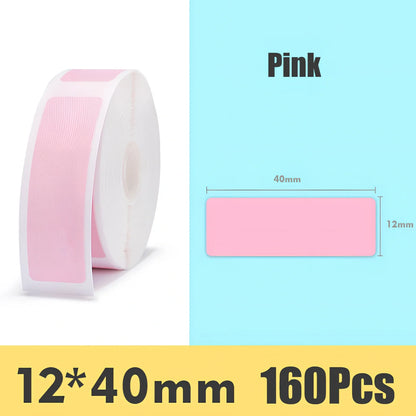 Pack of white D11 waterproof thermal label paper, 12x40mm size, showing clear printed text on resistant surface