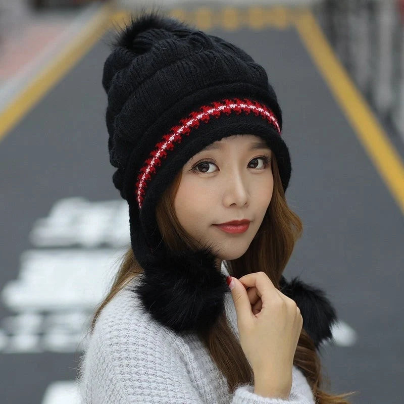 Knit fleece beanie with ear flaps and pompom in various colours for winter warmth