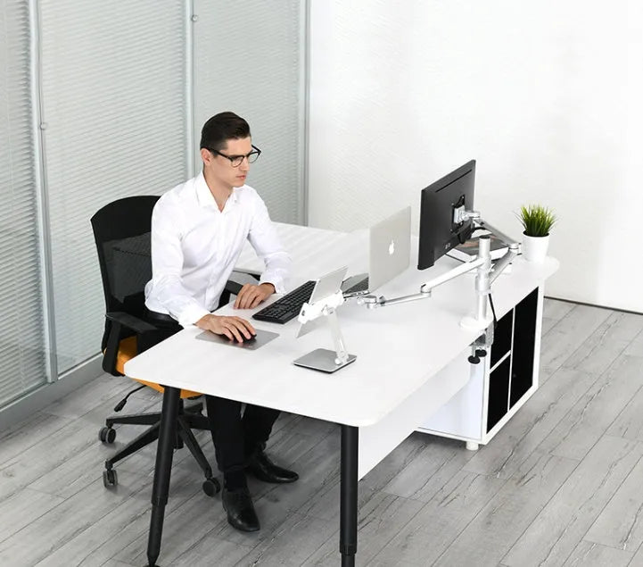 Silver aluminium foldable desktop stand holding a tablet, showing 360-degree rotation.