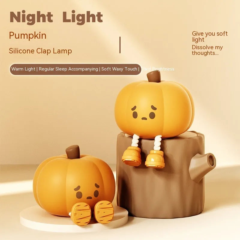 Soft silicone pumpkin night light with touch controls and warm LED glow