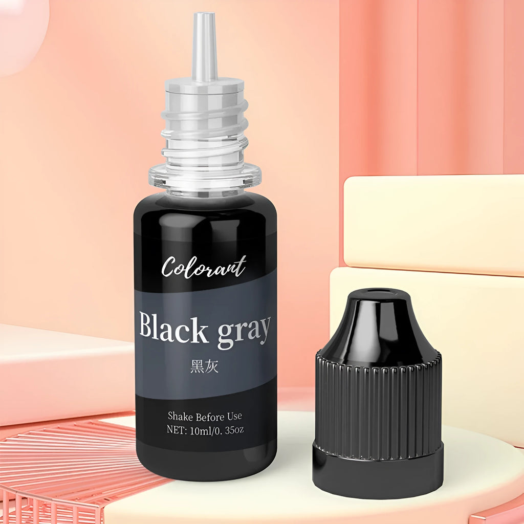 Set of 30 small bottles containing concentrated candle and soap dye pigments in various colours
