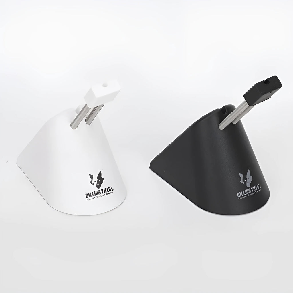 Black and white ABS plastic mouse cable holder bracket for wired gaming mice on a desk.