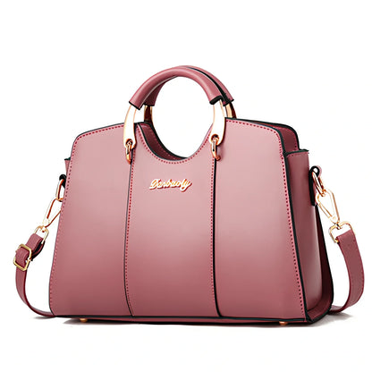 Women's shoulder bag with zipper closure measuring 28.5cm wide in wine red colour