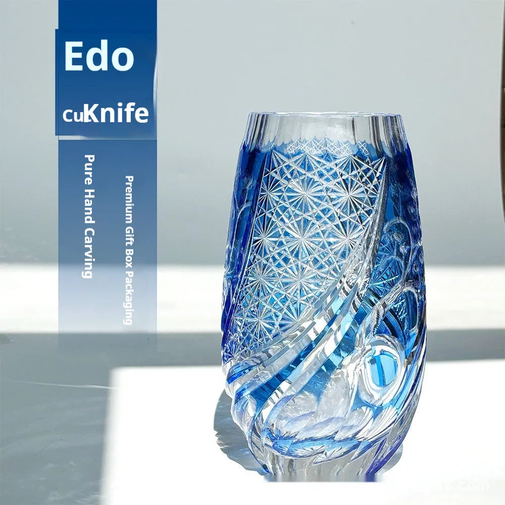 Blue Jianghu cut crystal glass tumbler 80x190mm on a table