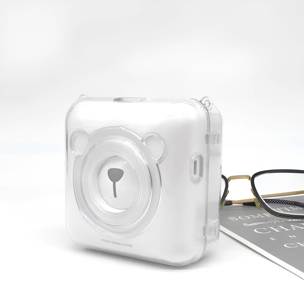 Crystal transparent PC protective case fitted on an Eric Bear A6 thermal printer, showing snap-on design