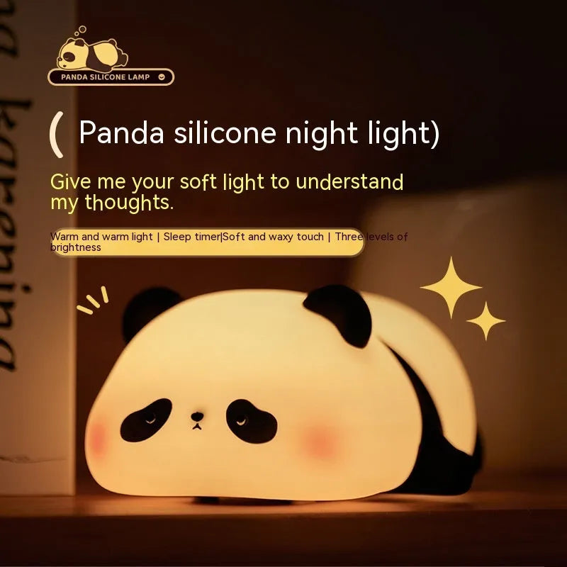 Cartoon panda-shaped night light made from blue silicone with clap activation feature