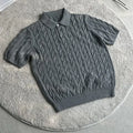 Man wearing a light grey twisted knit short sleeve casual t-shirt
