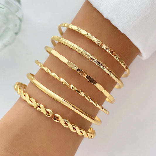 Bohemian metal chain bracelet set for women with geometric designs and thick gold-colored links