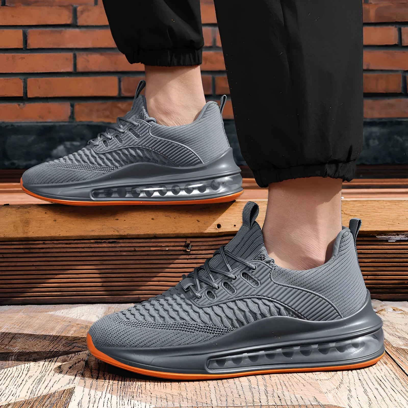 Men's black mesh running shoes with rubber sole and lace-up design for sports