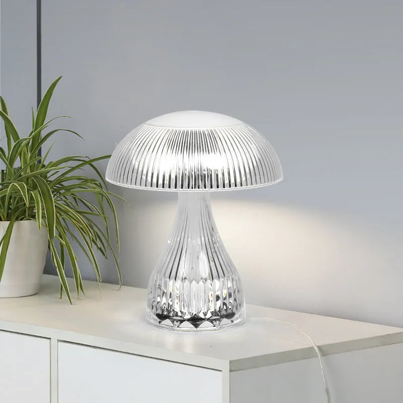 Small white USB rechargeable touch night lamp with three colour changing LED light.