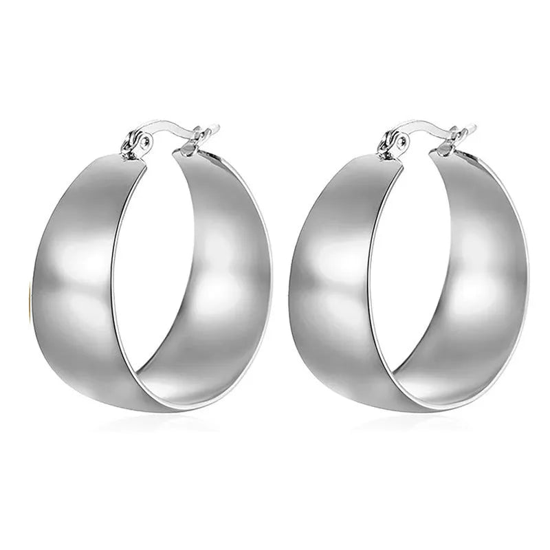 Widened curved stainless steel earrings in steel or gold colour, 25mm or 30mm size