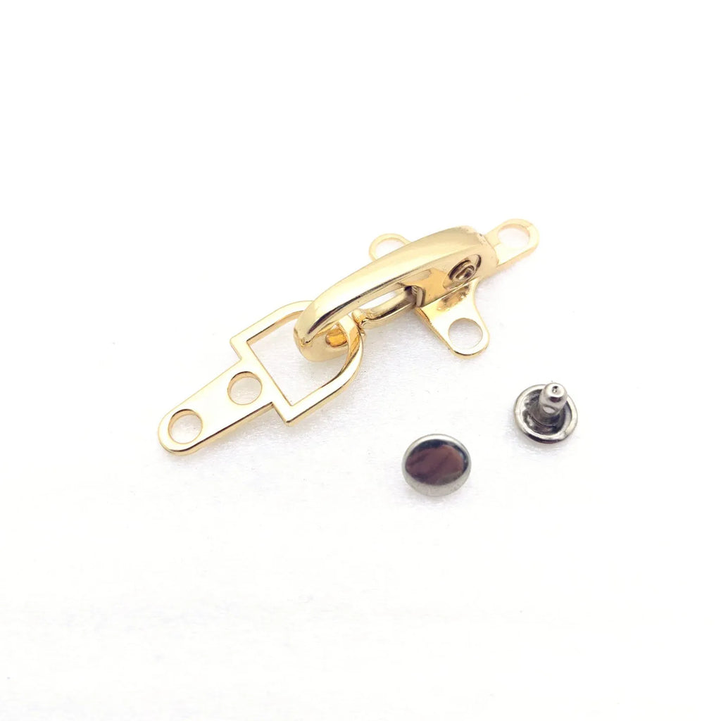 Zinc alloy aircraft-shaped hanging buckle in metallic finish, shown next to a ruler indicating 5.85cm size.
