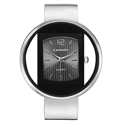 Women's gold black quartz cuff watch with 40mm dial, adjustable steel band 18mm wide, precise movement and water resistant