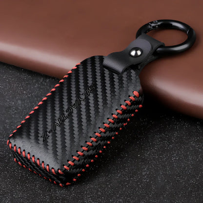 Black Angkesaila leather key case with 3D carbon fibre pattern and red stitching, 10 cm size for fob protection