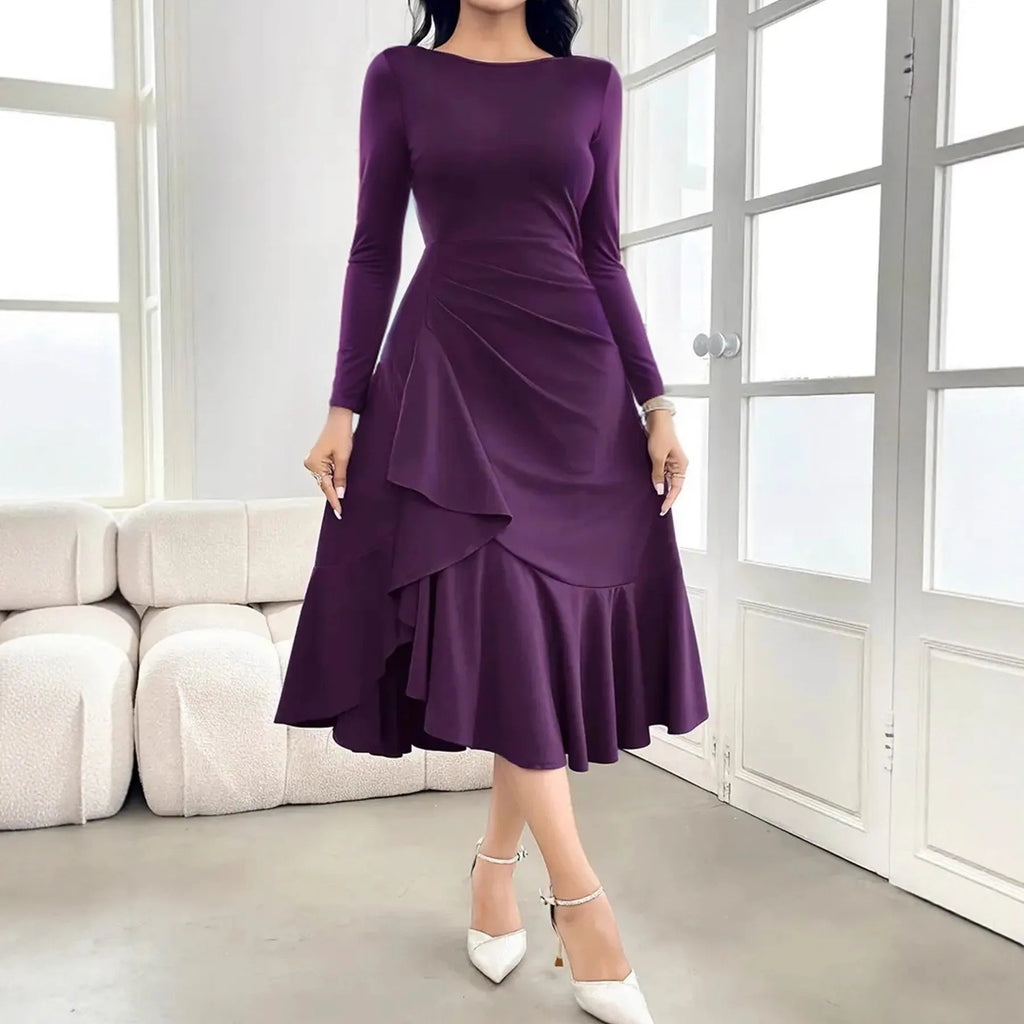 Purple women's long sleeve dress with ruffles and a round neck, showing a mid-waist fit.