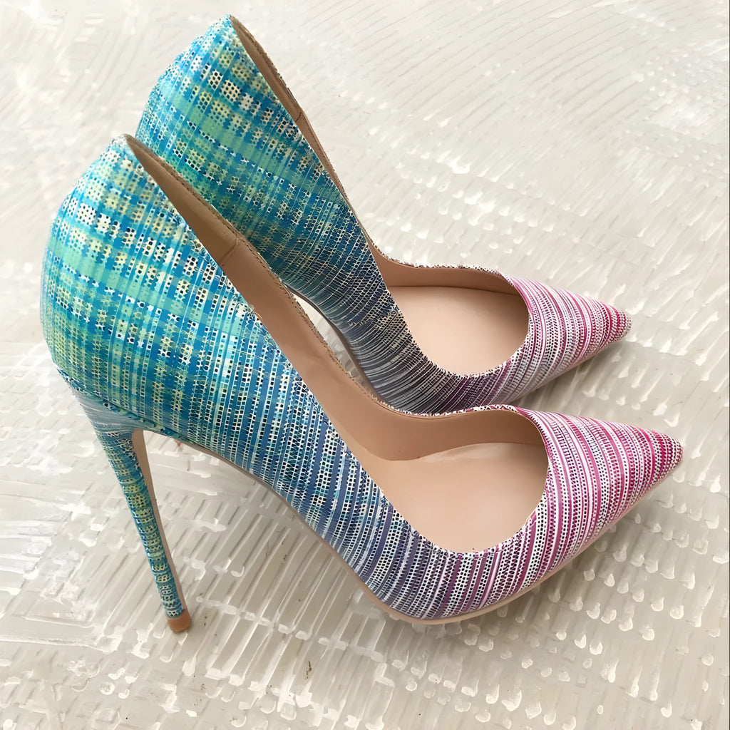 Women's pink and blue gradient patent leather pointed toe high heels on a rubber sole.