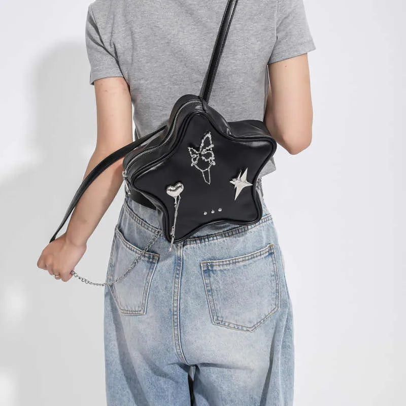Soft PU leather women's messenger bag worn crossbody, shown in black colour