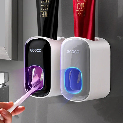 Wall-mounted automatic toothpaste dispenser with upside-down mouthwash cup for convenient and hygienic bathroom organization