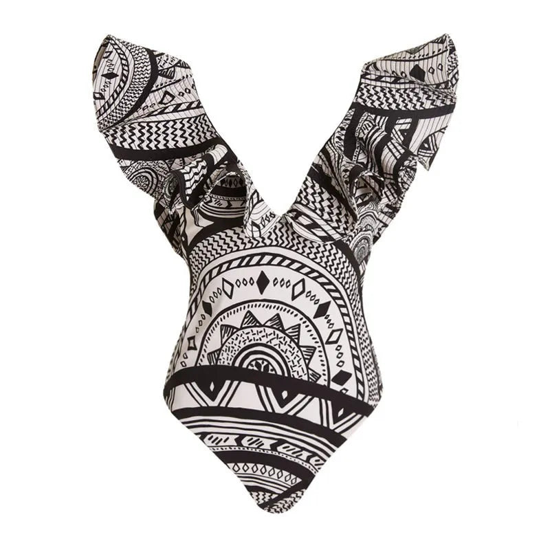 Women's vintage print deep V ruffled one-piece swimsuit with matching wrap skirt.