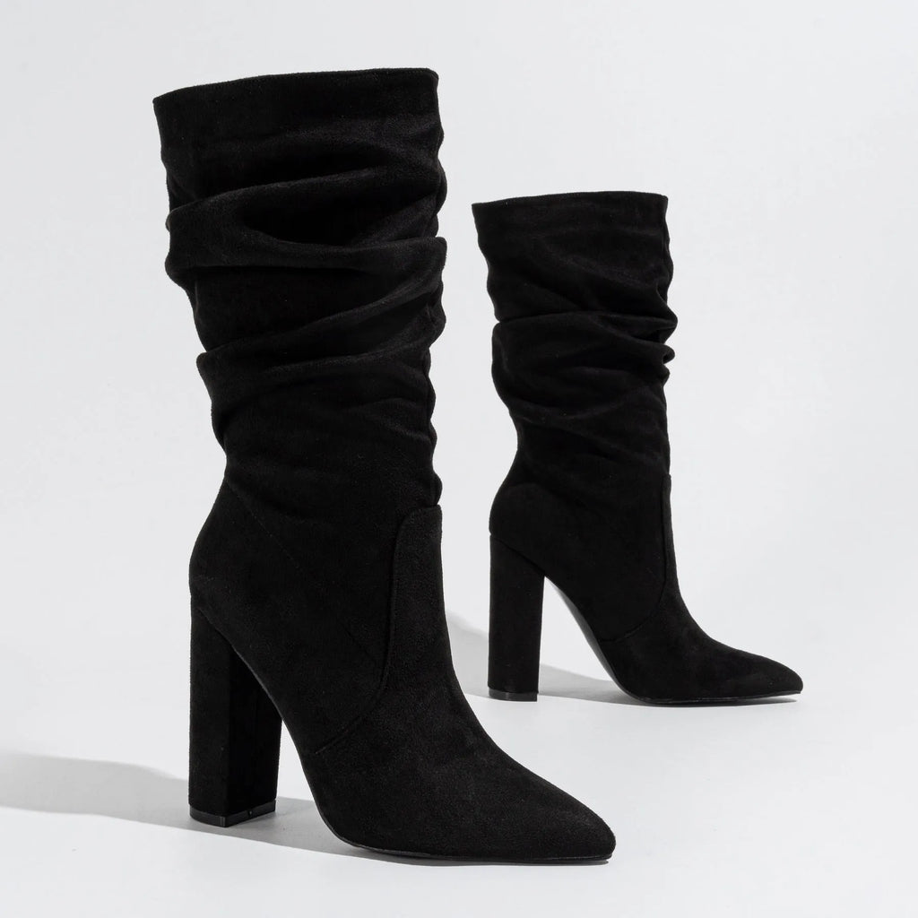 Women's black suede pointed-toe boots with chunky heel and mid-calf length