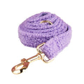 Four-piece dog accessory set showing collar, lead, bow and matching vest in cloth material