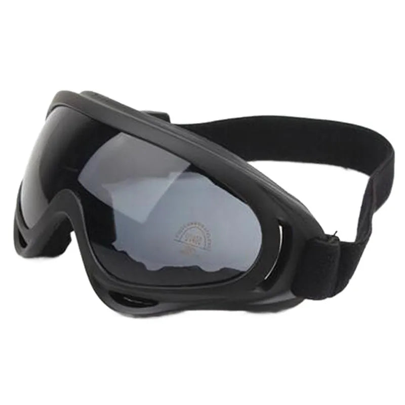 X400 motorcycle sand goggles with transparent PC lens on a rider wearing a helmet outdoors