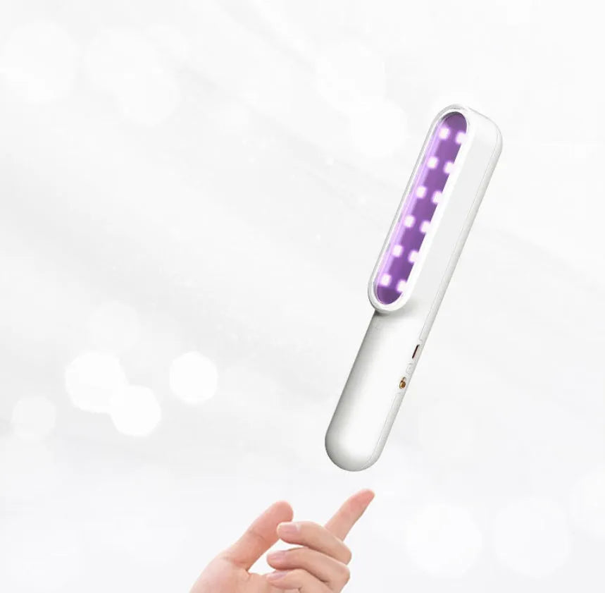 Portable UV hand-held sterilisation lamp in white, 219x34x40mm rechargeable design