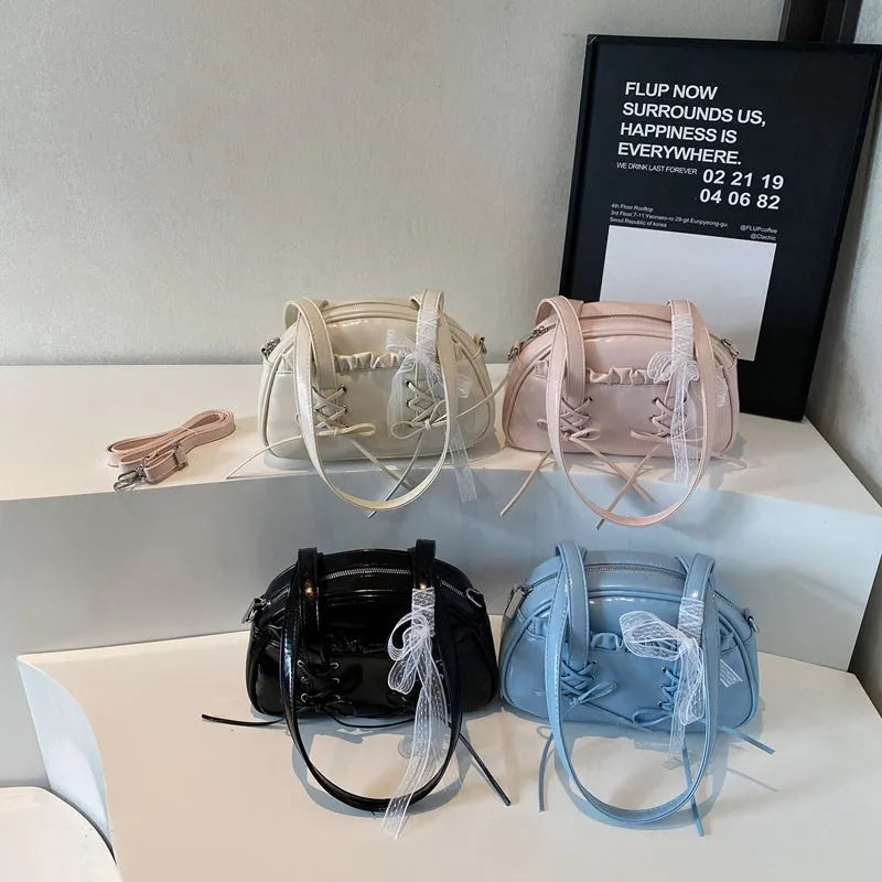 Women's casual PU bandage bow shoulder handbag with visible stitching, shown in milky white colour.