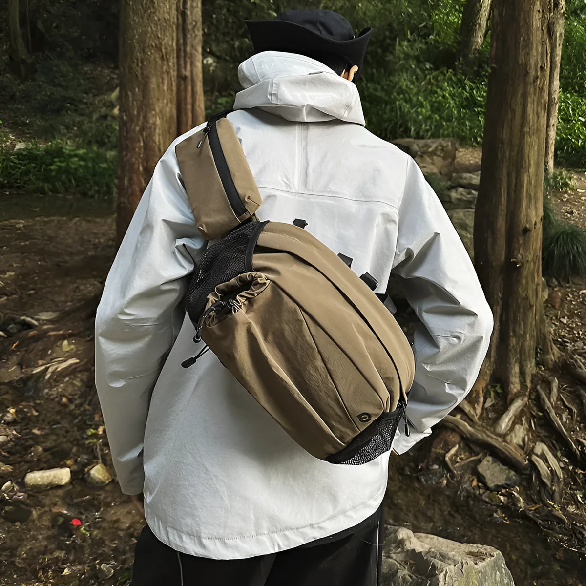 Army Green nylon convertible backpack that also functions as a waist bag with polyester lining