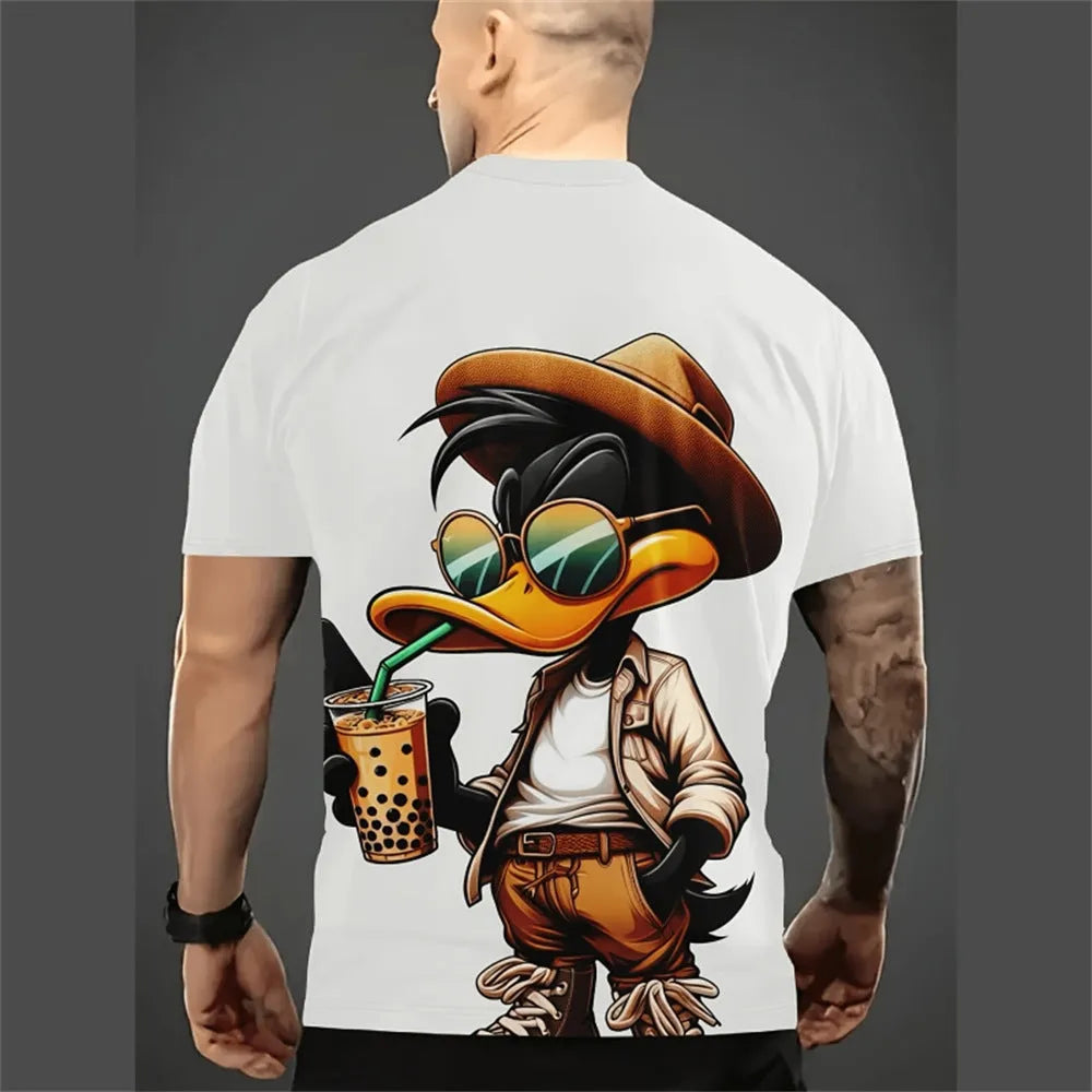 Man wearing a loose-fit grey t-shirt with a large colourful cartoon 3D print on the front.