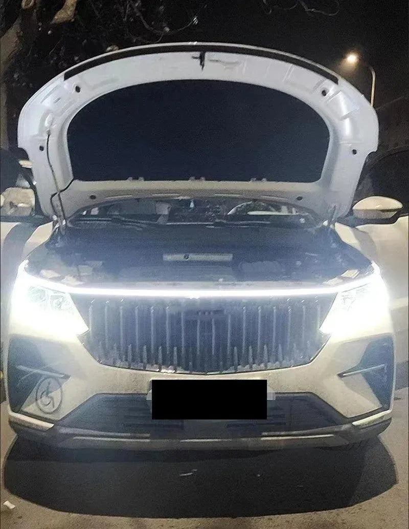 Flexible silicone car daytime running light strip with scanning effect, shown in white, ice blue and red colour options.