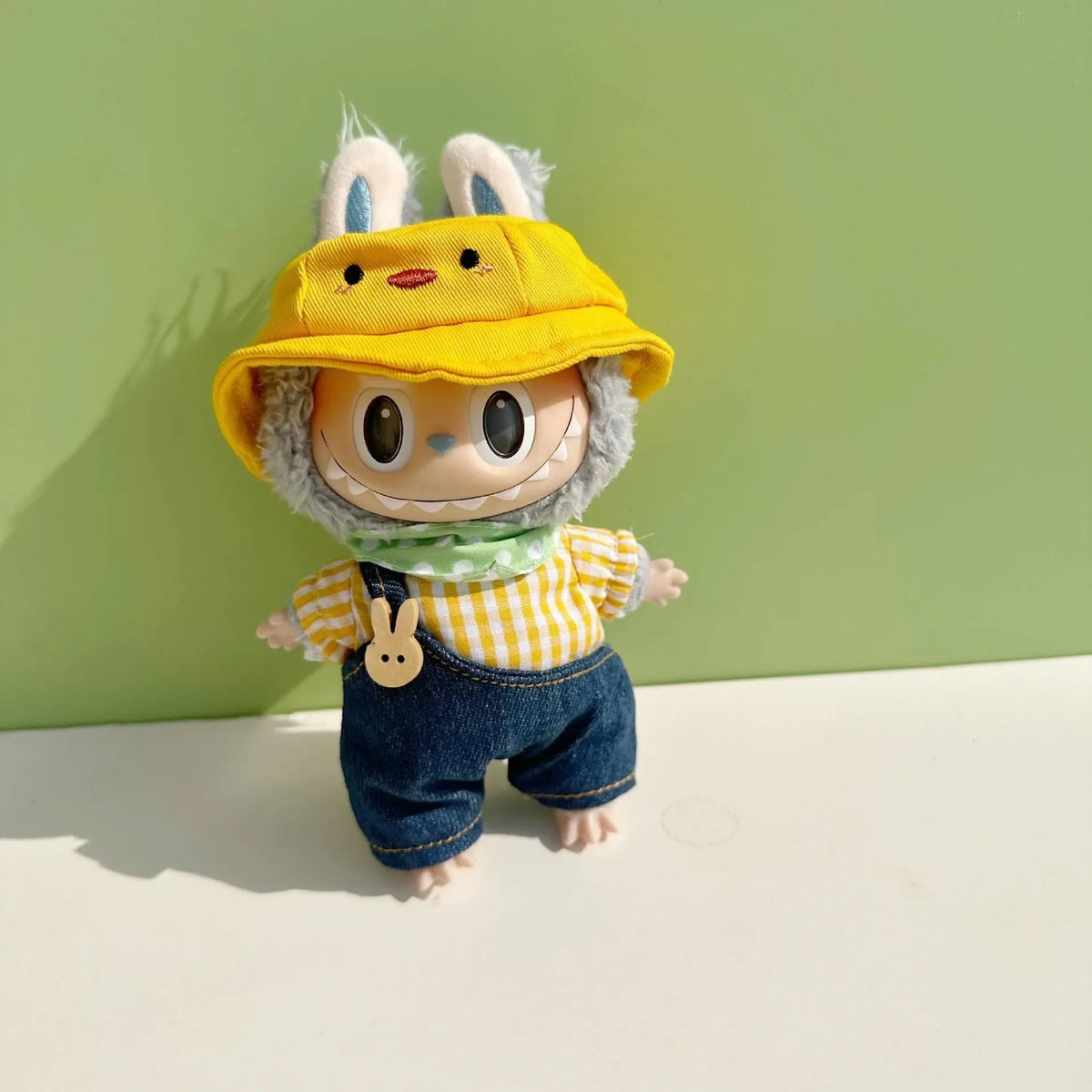 15cm doll clothes pendant in plush fabric, removable and washable, featuring a themed suit design for small dolls