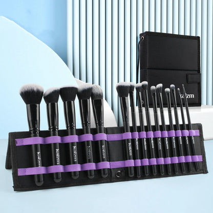 Black 15-piece makeup brush set with wooden handles and folding cloth storage bag