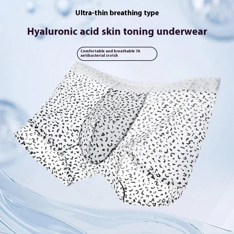 Men's black leopard print ice silk boxers showing mid-waist fit and knitted fabric texture.