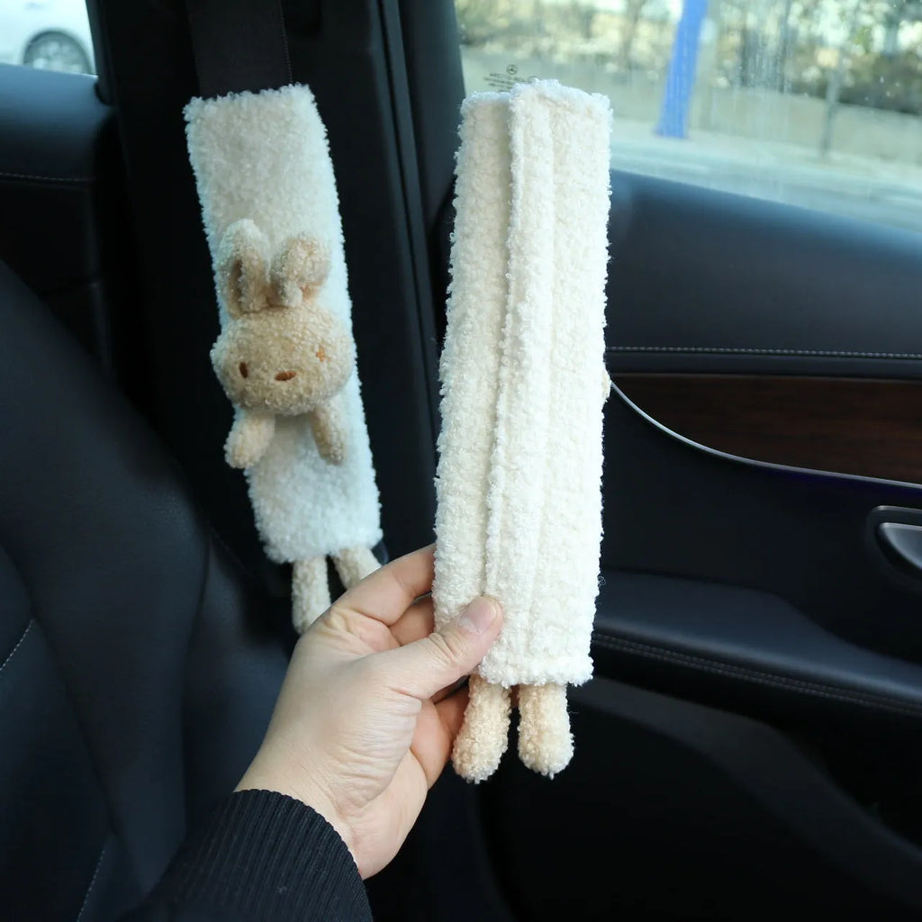Cartoon plush lamb wool car seat belt shoulder protector in rabbit, bear, or rabbit+bear design.