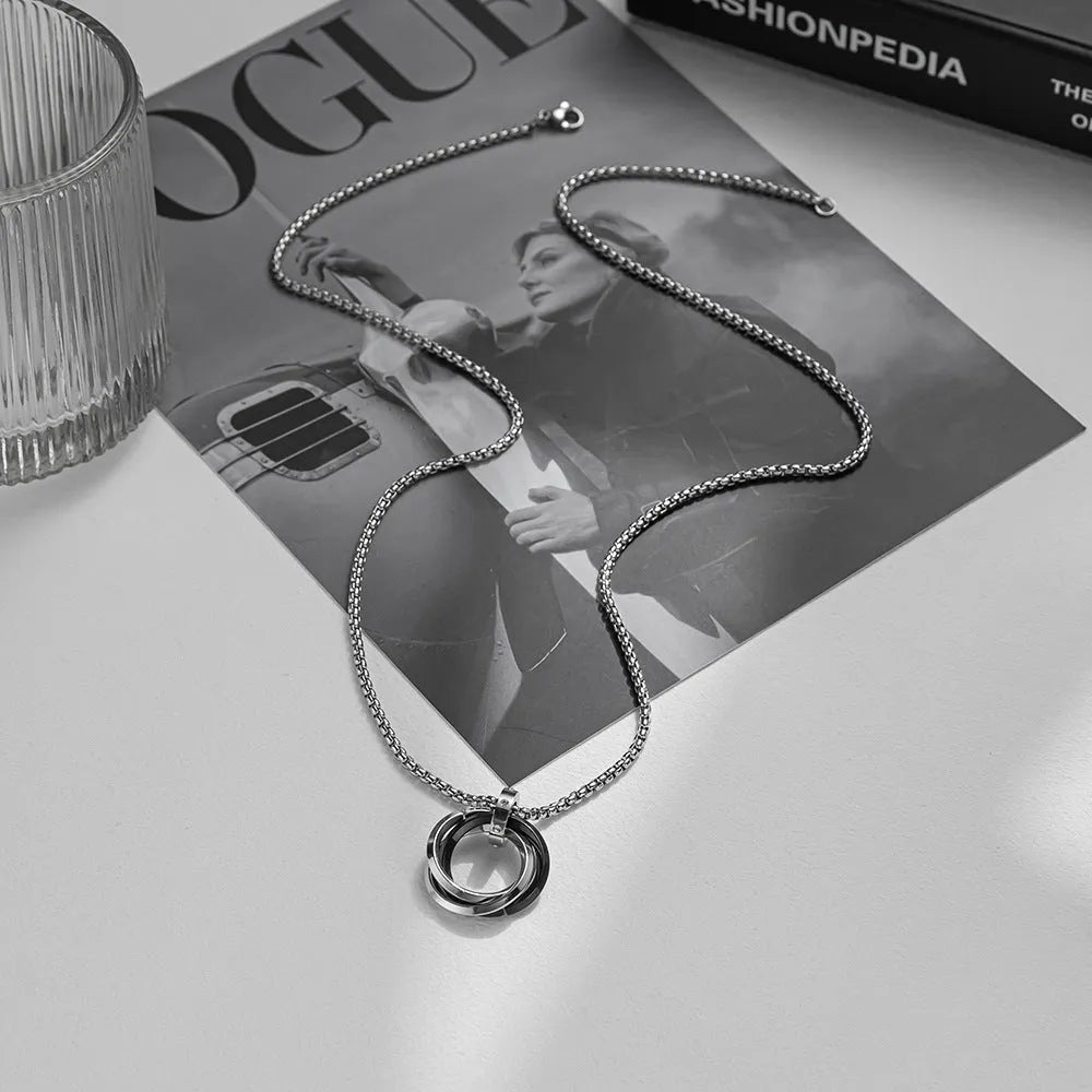 Men's geometric pendant necklace in titanium steel with electroplated black finish on a simple chain