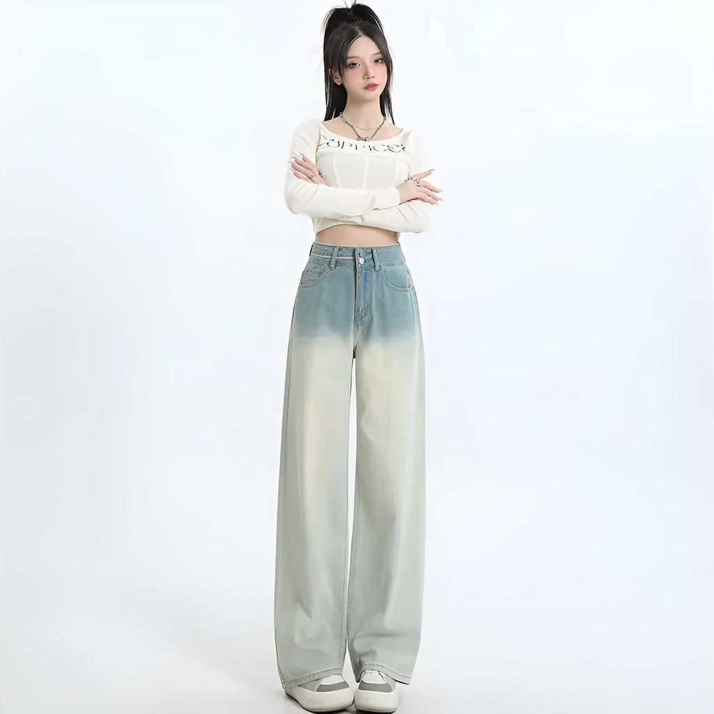 Women's gradient blue straight-leg wide leg cotton denim trousers laid flat.