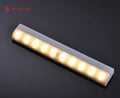 Aluminium magnetic LED closet light with motion sensor on a wardrobe shelf.