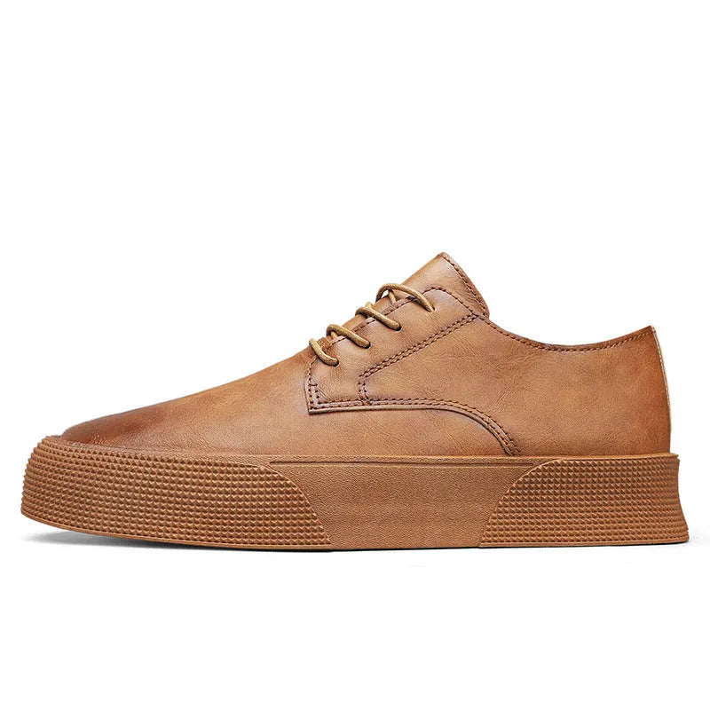 Men's lace-up platform board shoes in solid brown with round toe and low-top silhouette on a neutral background
