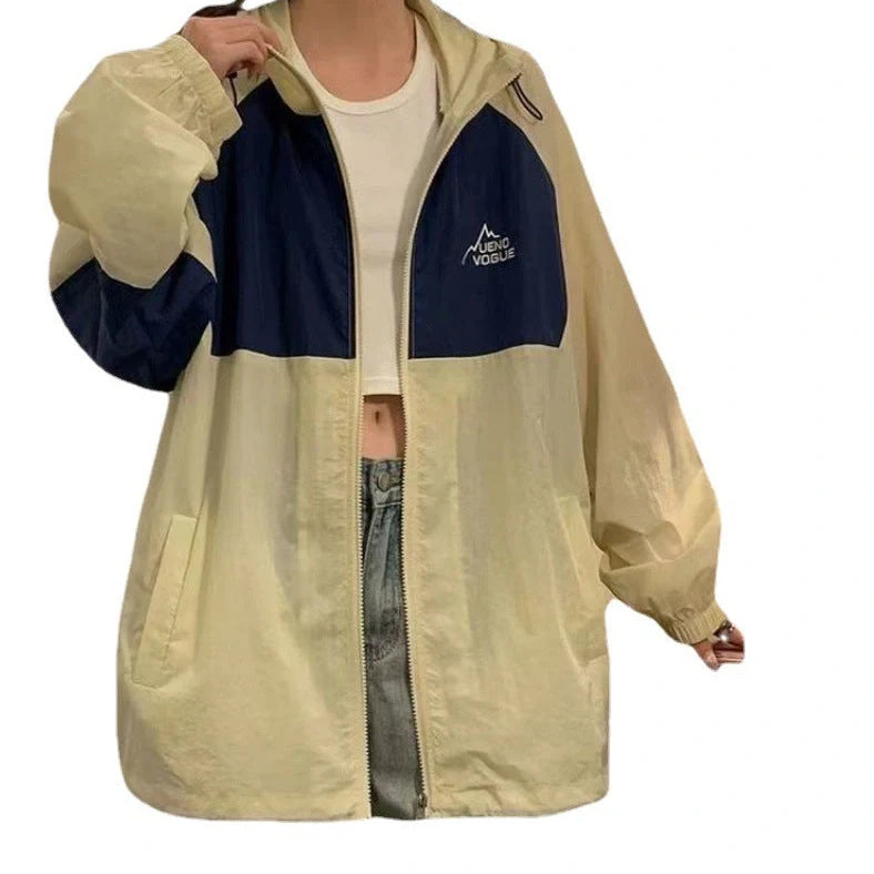 Women's summer sun protection top with raglan sleeves in apricot colour showing loose fit and splicing details