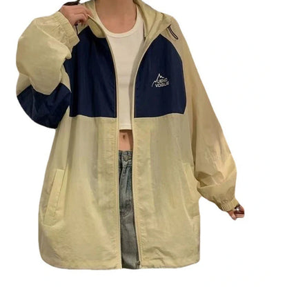 Women's summer sun protection top with raglan sleeves in apricot colour showing loose fit and splicing details