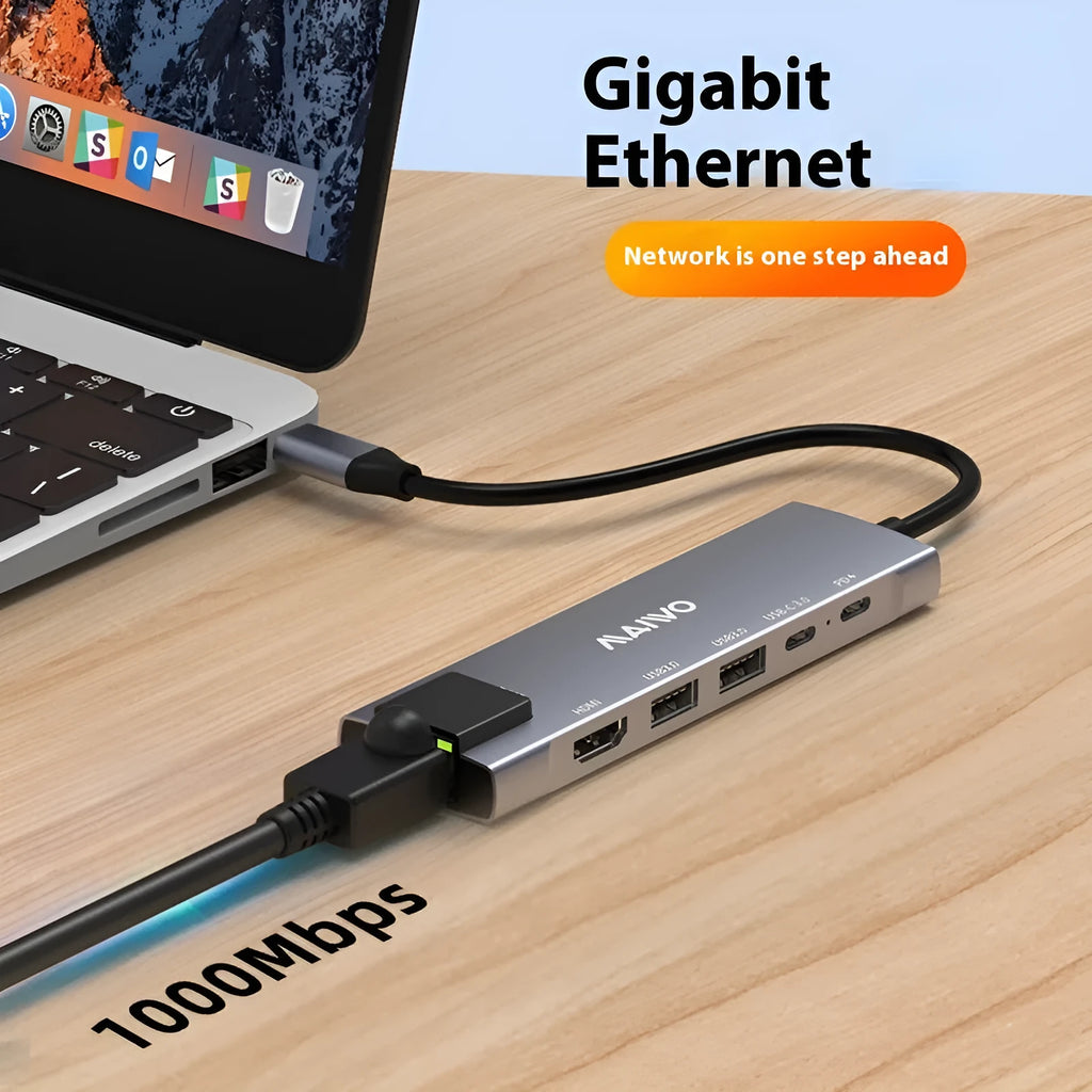 Aluminium alloy Steam Deck six-in-one docking station with USB-C cable and labelled ports for HDMI, Ethernet, and USB.