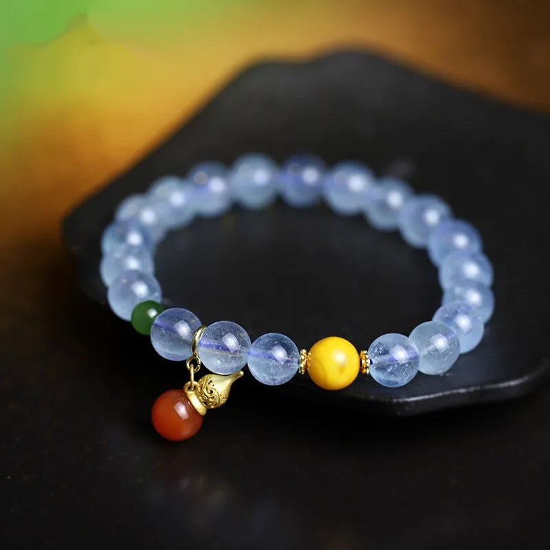 8mm aquamarine crystal bracelet with geometric design and ethnic retro styling in iced aquamarine colour