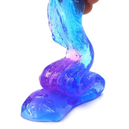 Gradient multicolor crystal mud slime in a plastic box, showcasing its vibrant colors and smooth texture