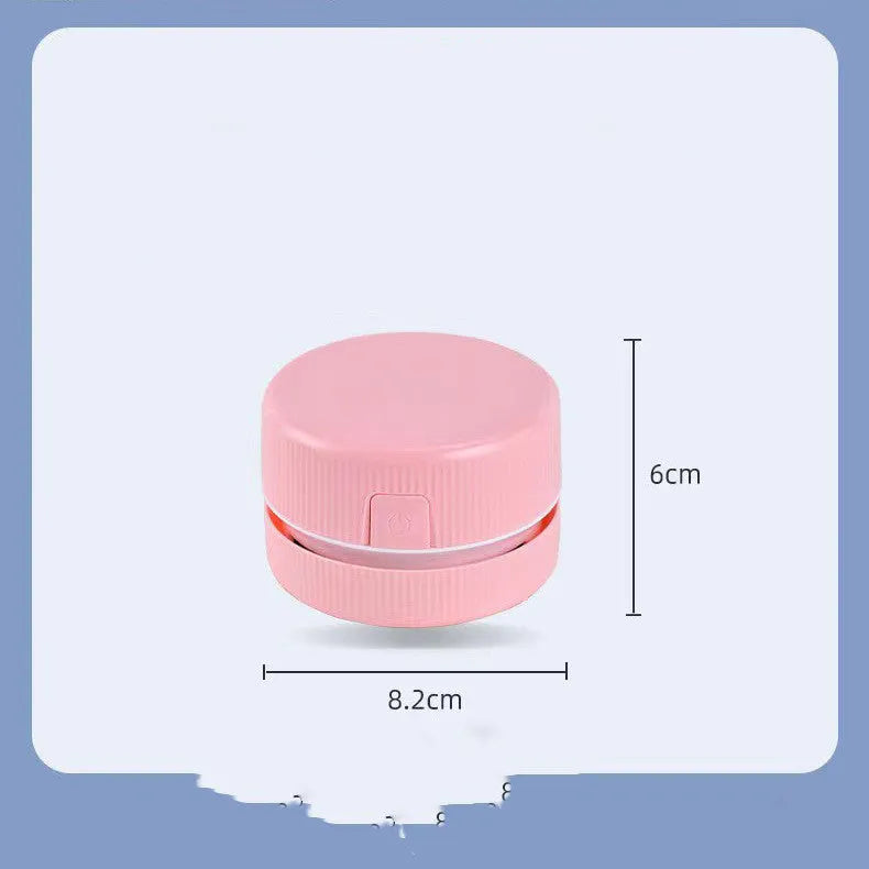 Blue portable mini handheld desktop vacuum cleaner with dust box for eraser chips.
