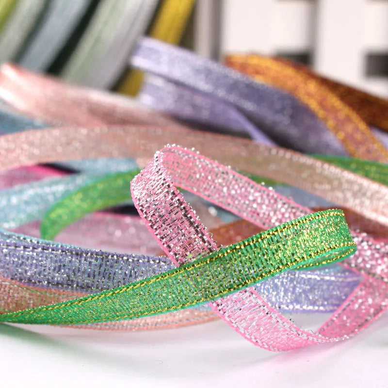 A roll of narrow 0.6cm wide polyester ribbon in a chosen colour from a palette of 23 options.